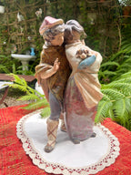 Figura pareja con perro de Lladrò.