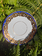 Plato postre O Castro, decoración azul/oro.