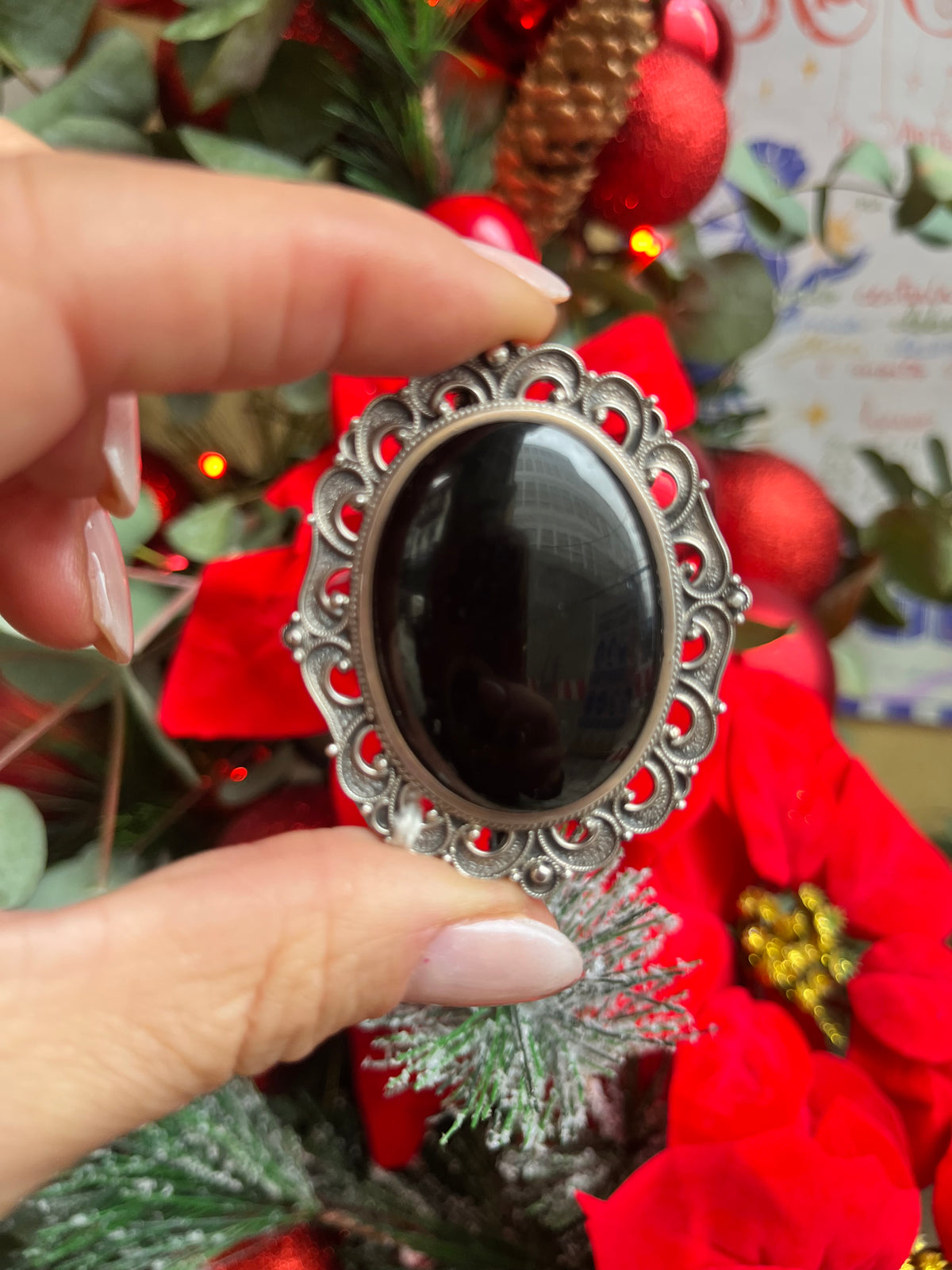 Broche plata y azabache.