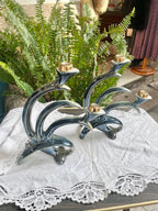 Pareja de candelabros vintage en porcelana esmaltada.