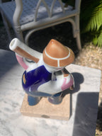 Figura Gaiteiro de Sargadelos sobre base de Màrmol.