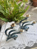 Pareja de candelabros vintage en porcelana esmaltada.