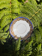 Plato postre O Castro, decoración azul/oro.