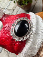 Broche plata y azabache.