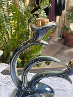 Pareja de candelabros vintage en porcelana esmaltada.