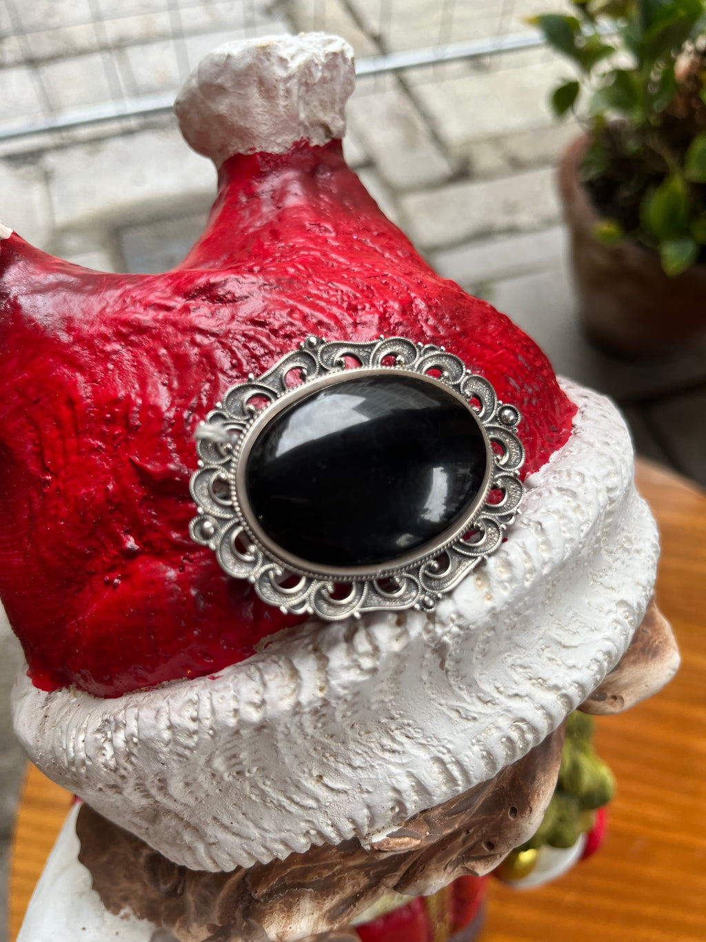 Broche plata y azabache.