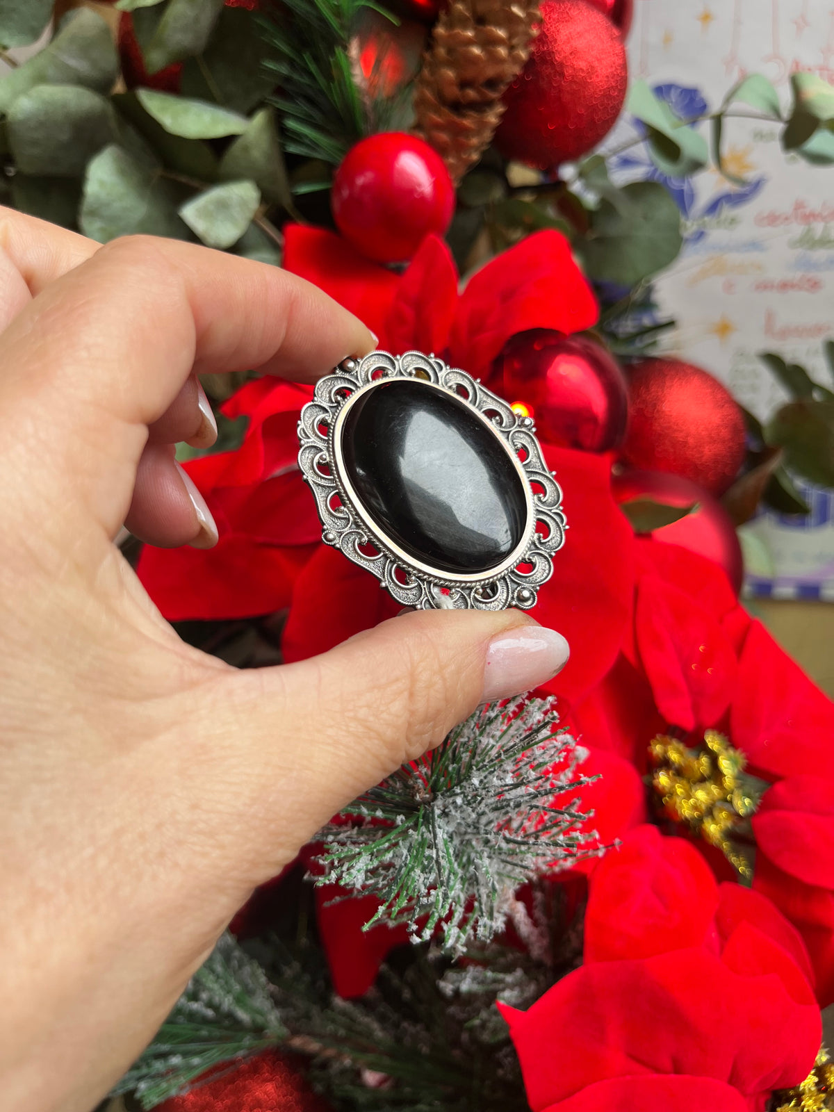 Broche plata y azabache.